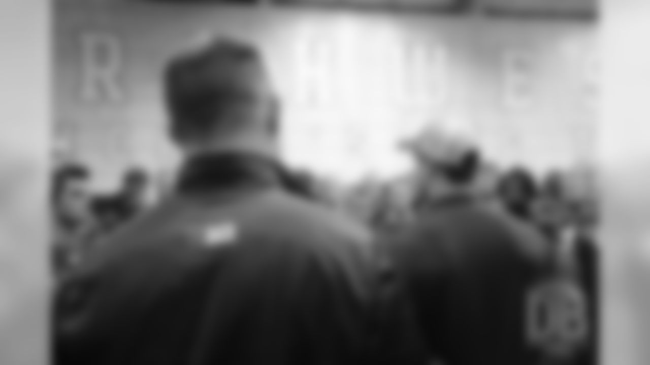 Northwestern coach Pat Fitzgerald looks on as former Northwestern quarterback Trevor Siemian addresses Northwestern's football team on Friday afternoon before their homecoming game against Penn State.