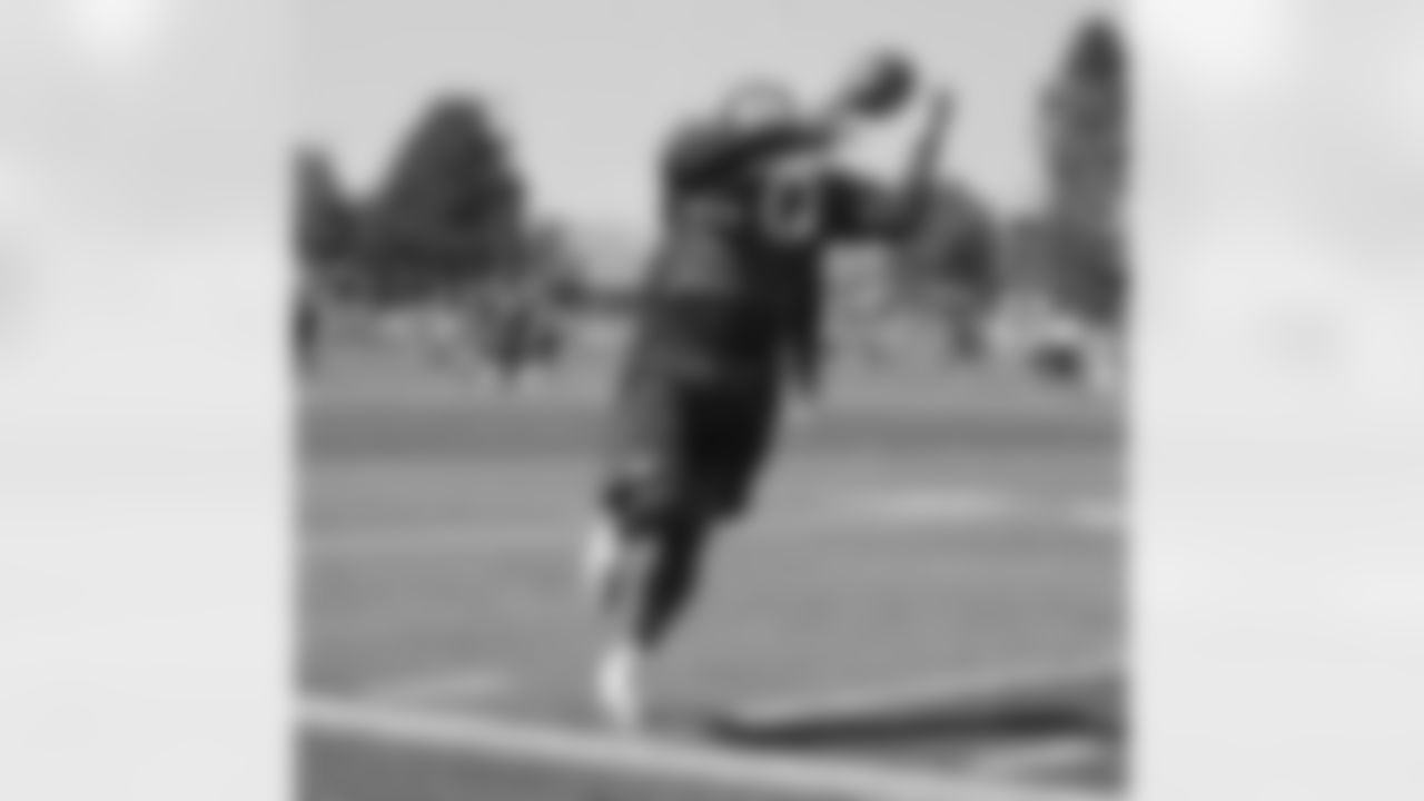 Adams looks back over his shoulder for the ball.