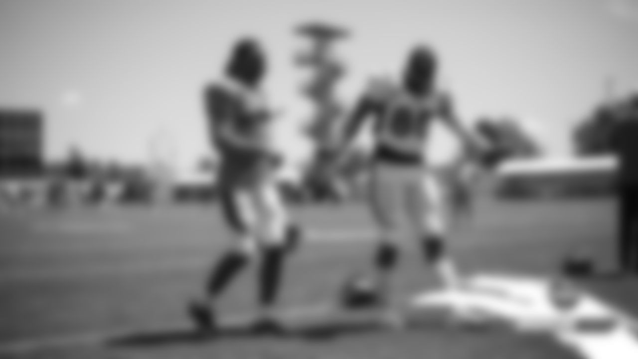 Will Parks and Bug Howard dance before practice on Day 6 of training camp on July 24, 2019.