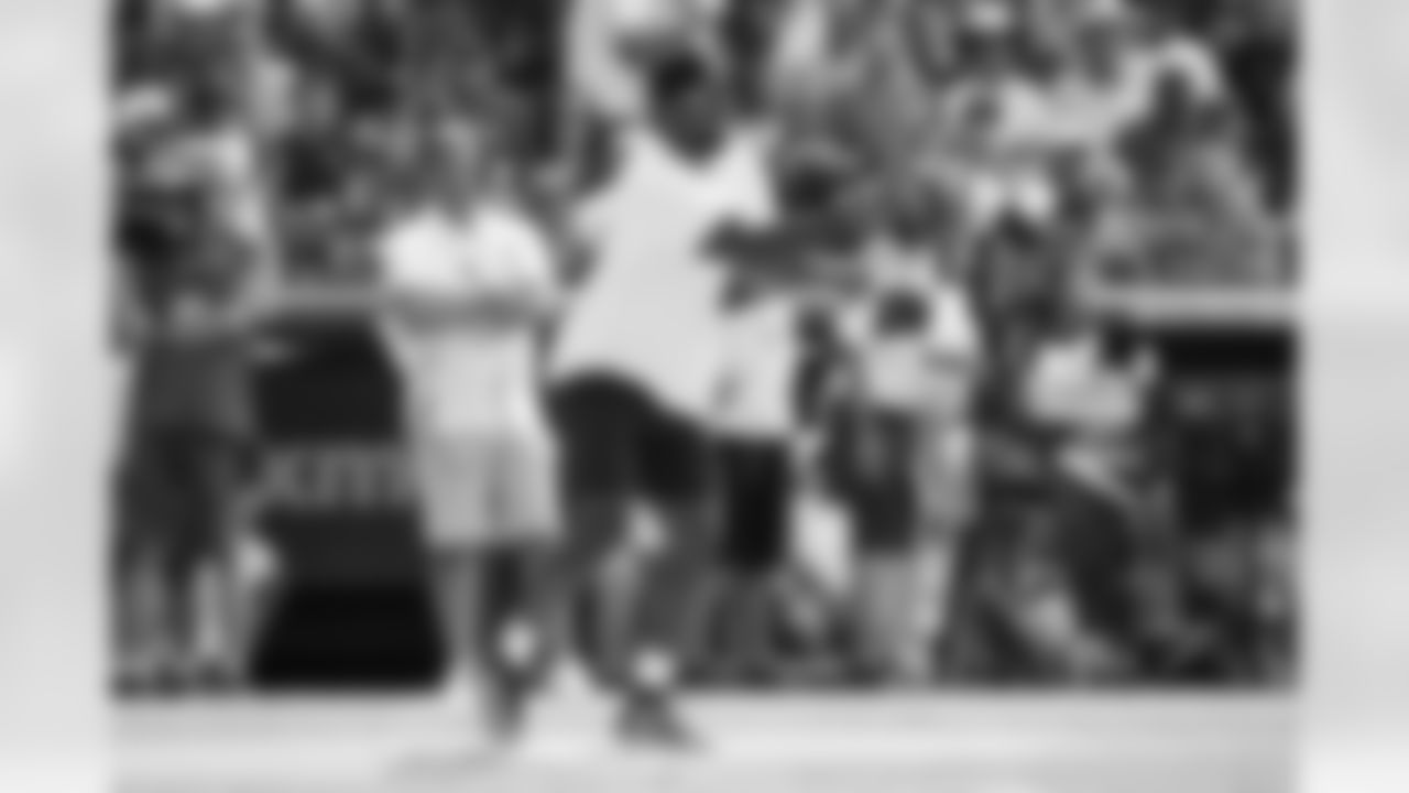 Von Miller bunts at the 2021 MLB All-Star Celebrity Softball Game at Coors Field on July 11, 2021. (Photo by Ben Swanson)