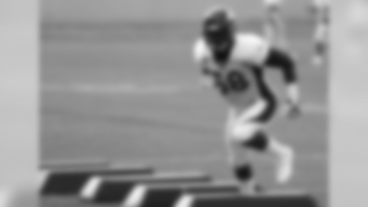 LB Von Miller works on his footwork during a drill.