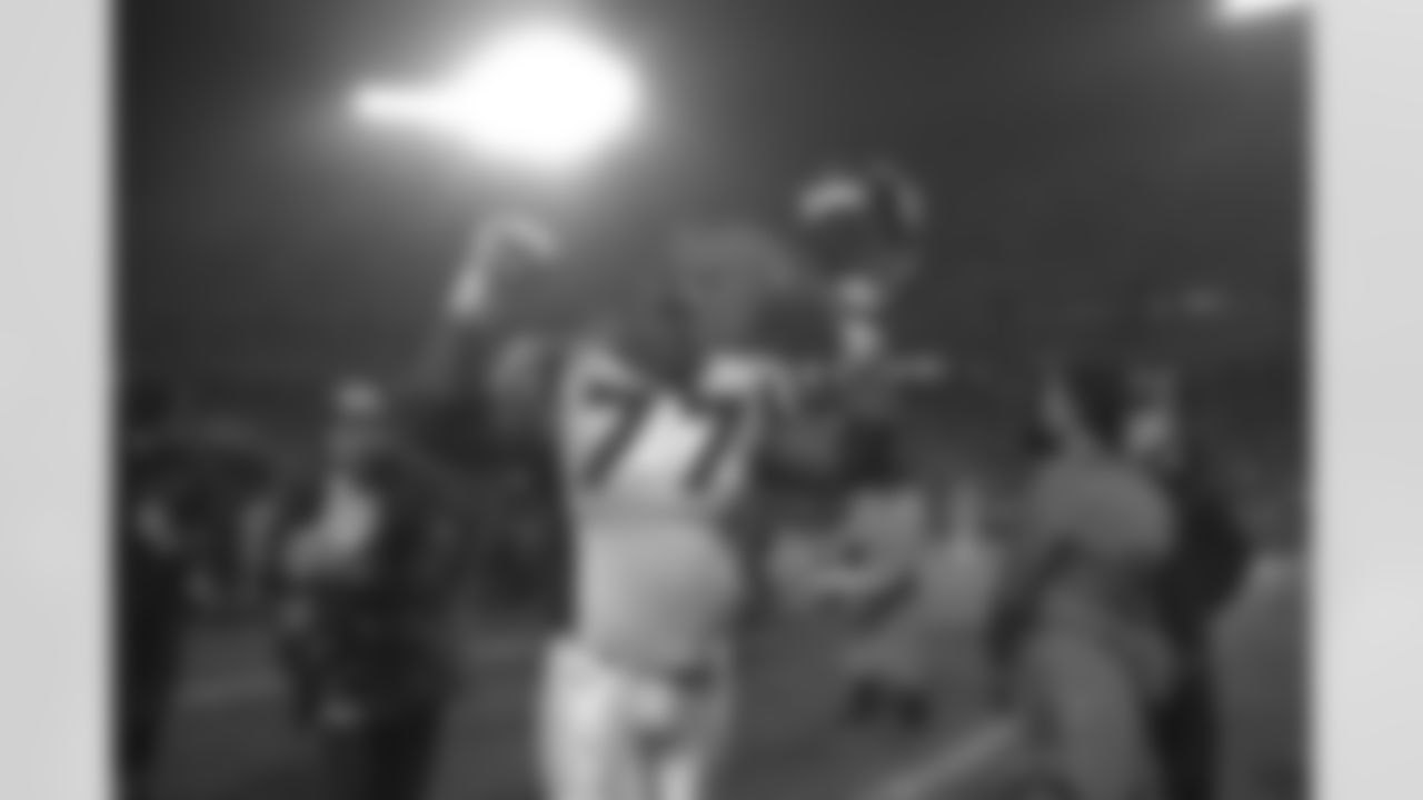 Kansas City: Tony Jones walks triumphantly off the Arrowhead Stadium Field after the Broncos win their second round playoff game against the Kansas City Chiefs at Arrowhead Stadium in Kansas City, MO on January 4, 1998.