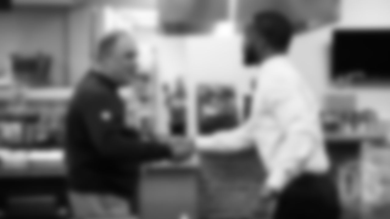 Head Coach Vic Fangio greets Kareem Jackson during his first day as a Bronco at UCHealth Training Center after signing a contract with Denver as a free agent on March 15, 2019.