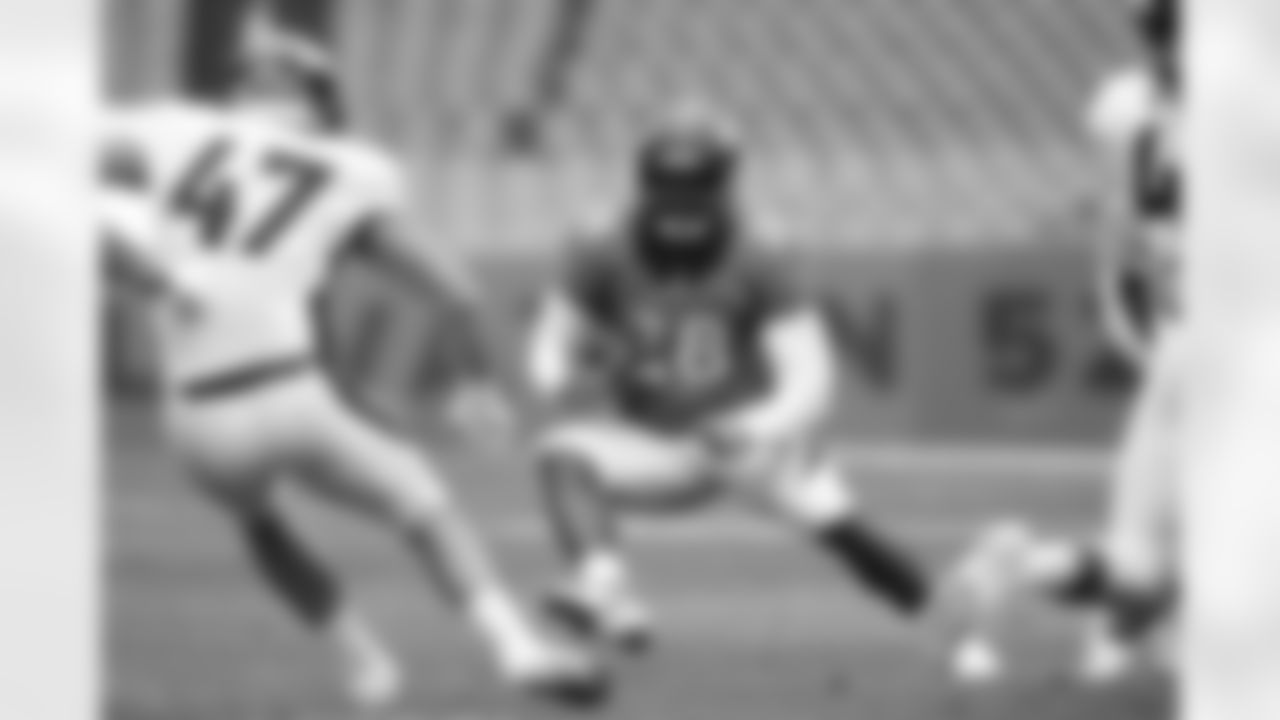 Royce Freeman runs with the ball during practice on Day 12 of training camp at Empower Field at Mile High on August 29, 2020. (Photo by Ben Swanson)