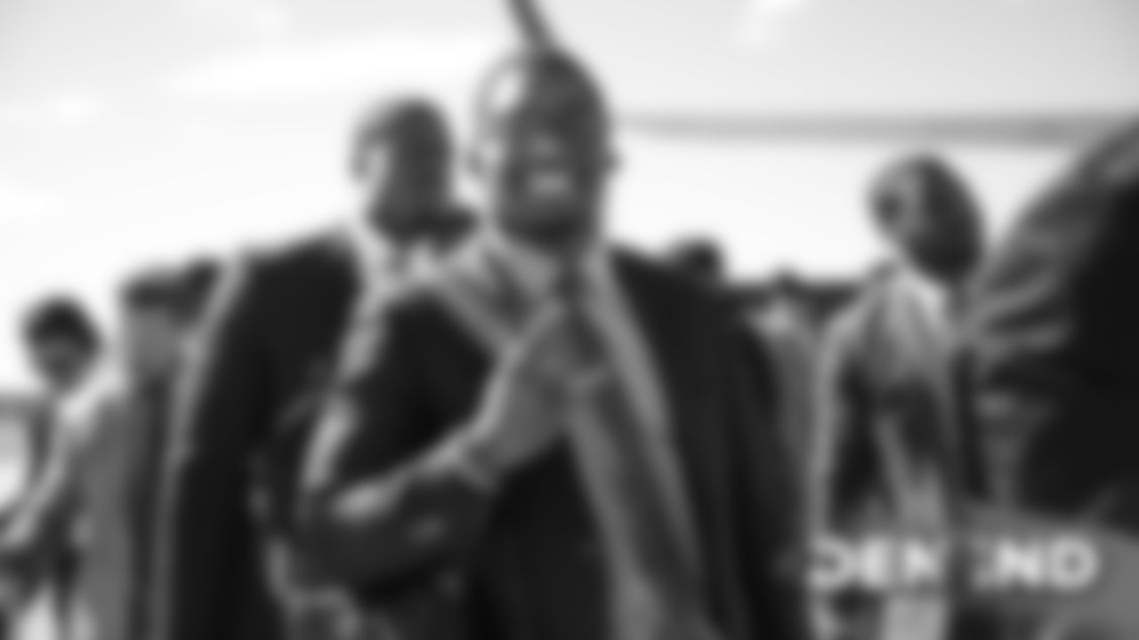 Corey Nelson on the tarmac at Denver International Airport during the team's travel to Indiana on October 26, 2019 ahead of their Week 8 game against the Indianapolis Colts. (Photo by Ben Swanson)