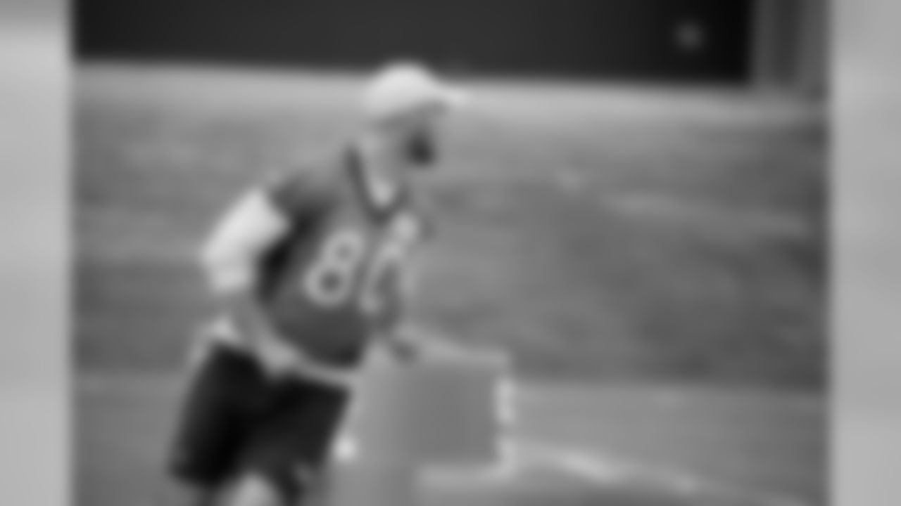 Tight end Jake Butt, an eligible non-rookie player, runs a route at a rookie minicamp walkthrough on Friday afternoon.