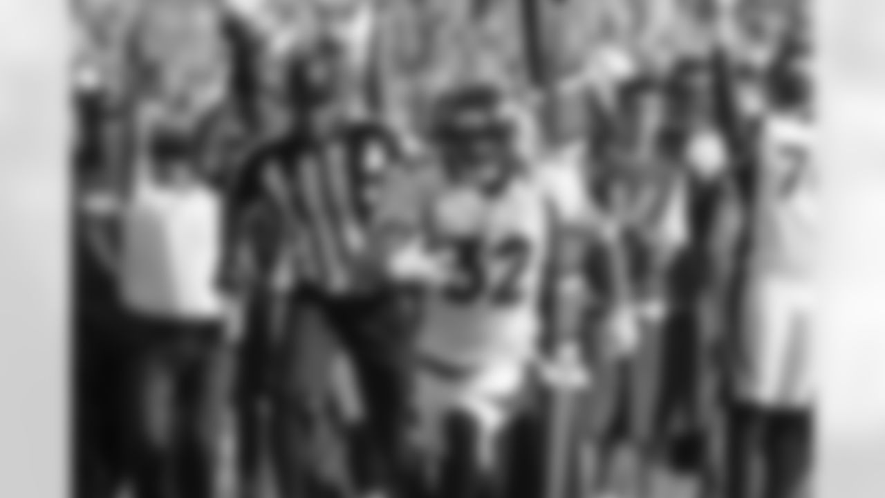 Miller pressures Newton, forcing an errant throw that was intercepted and returned for a touchdown by CB Tony Carter.