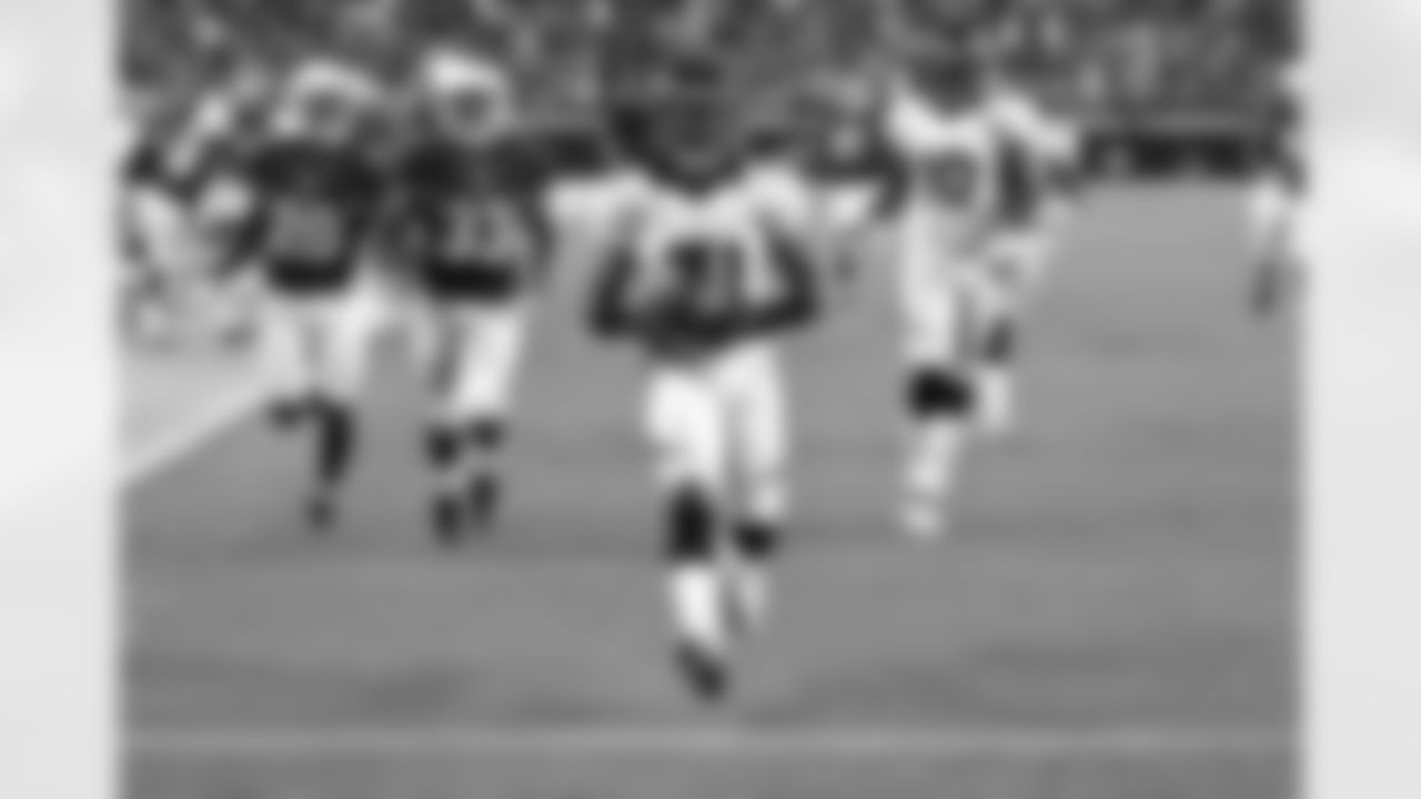 Cornerback Omar Bolden strides into the end zone on a 103-yard kickoff return for a touchdown against the Arizona Cardinals.