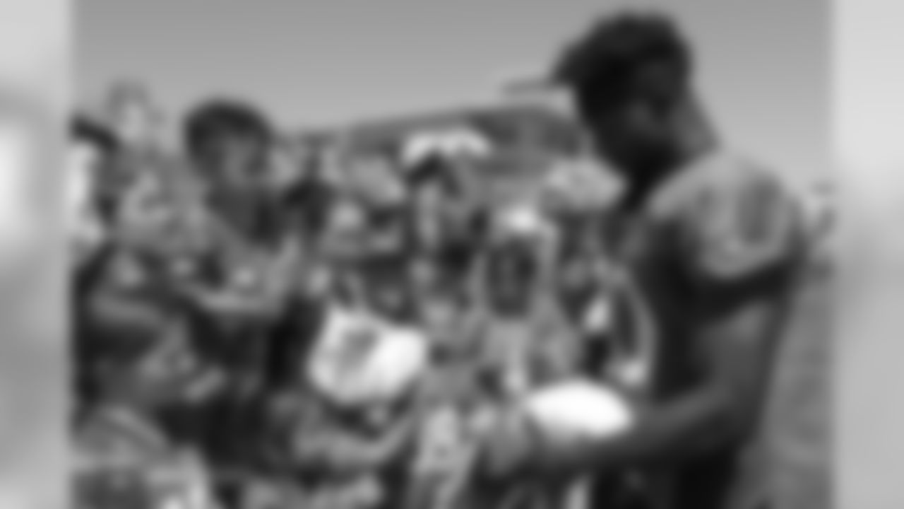 Wide receiver Emmanuel Sanders (10) signs autographs after the 11th day of training camp on August 9, 2018, at UCHealth Training Center.