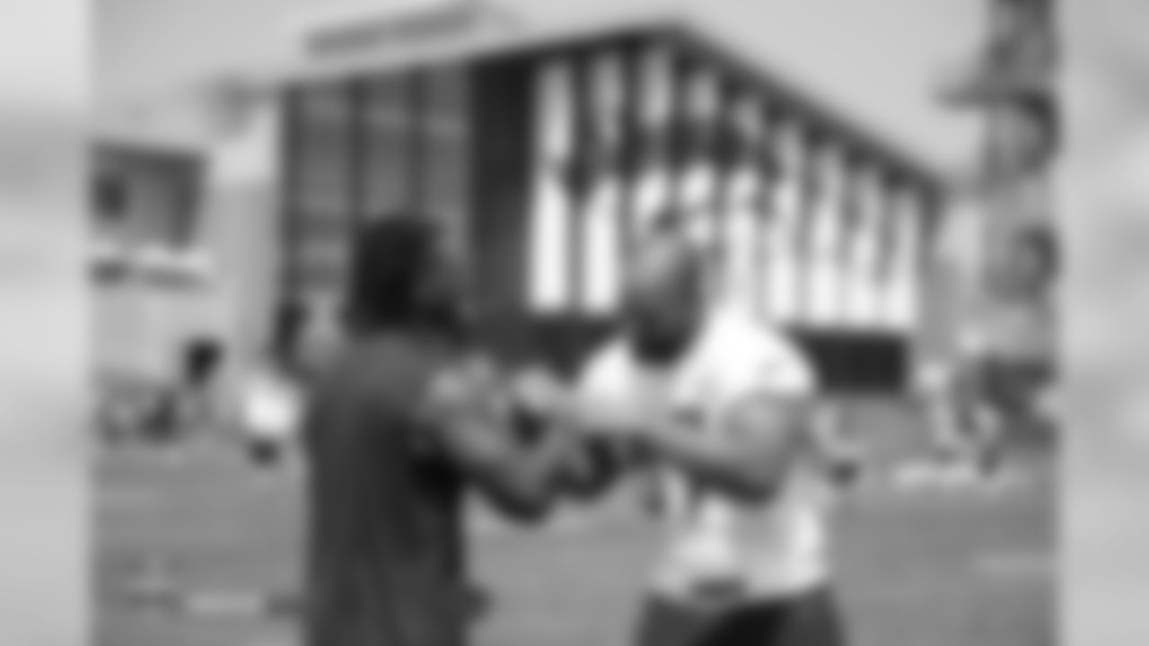 Todd Davis and former Broncos LB Kasim Edebali during training camp at UCHealth Training Center in Centennial, CO, August 16, 2018.
Photo by Gabriel Christus