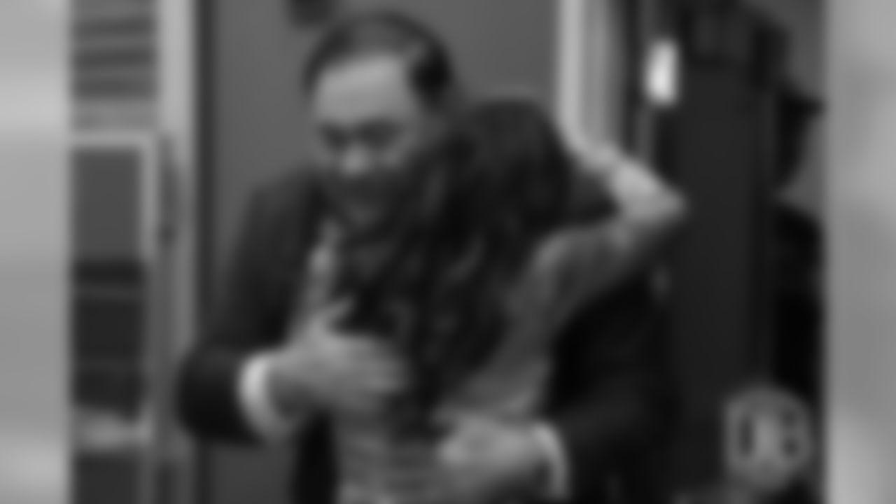 Beth Bowlen Wallace hugs David Baker after he gave the news that Pat Bowlen was elected for enshrinement in the Pro Football Hall of Fame's Class of 2019 on February 2, 2019.