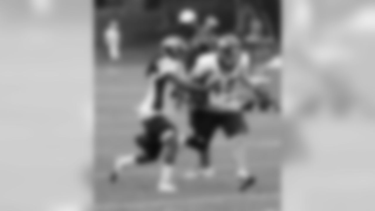 CB Syd'Quan Thompson strips S Jim Leonhard.