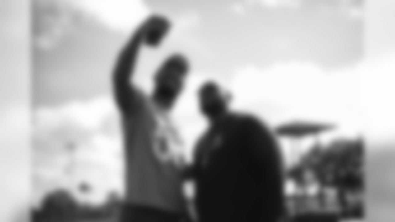 Von Miller takes a selfie with a fan at the Wounded Warrior Project flag football game during the Pro Bowl Community Huddle day of service as part of the Huddle for 100 initiative at the 2020 Pro Bowl on January 24, 2020 at the ESPN Wide World of Sports Complex in Orlando, Florida. (Photo by Ben Swanson)
