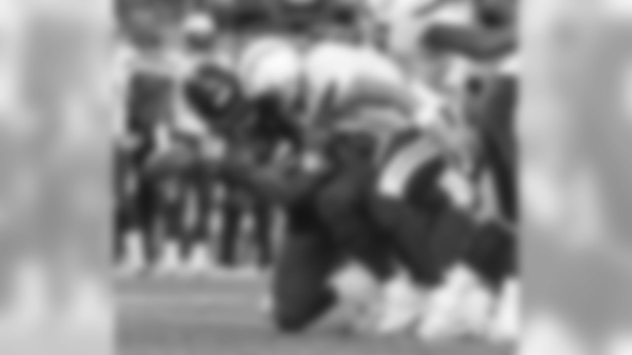 Miller strip-sacks Chargers QB Philip Rivers, and LB Wesley Woodyard recovers the fumble.