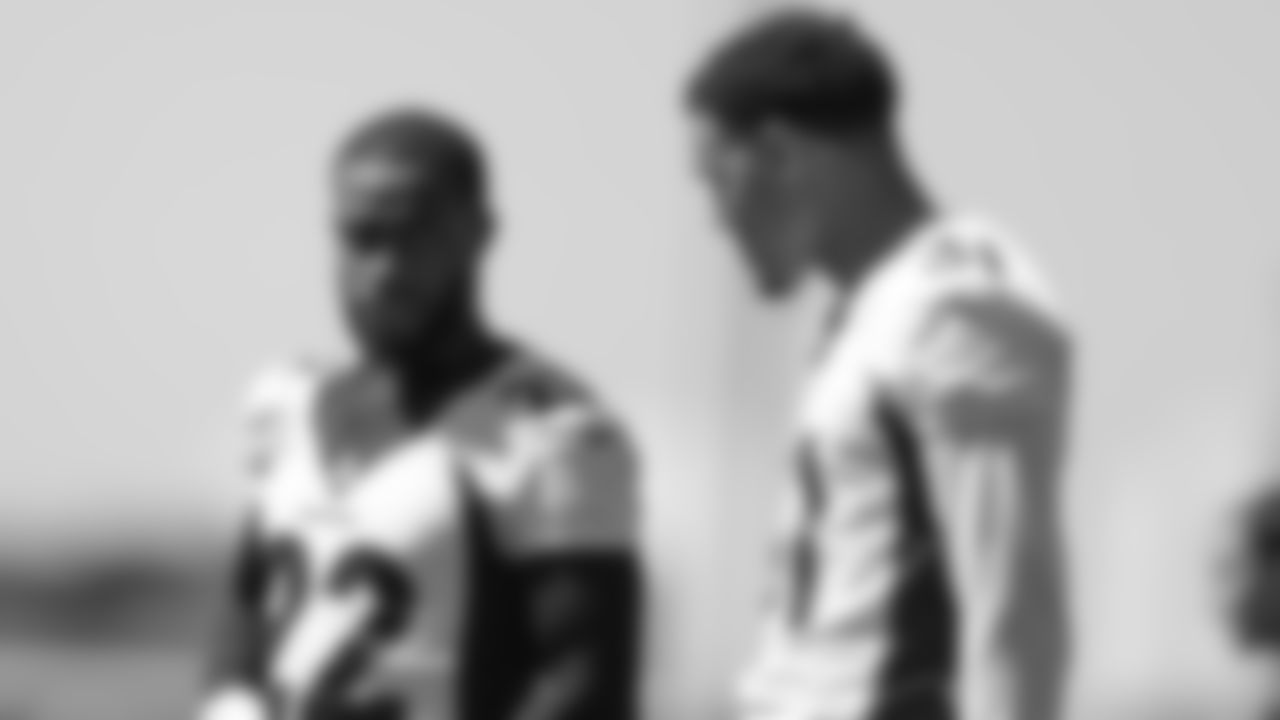 Kareem Jackson and Justin Simmons chat during Day 2 of OTAs.