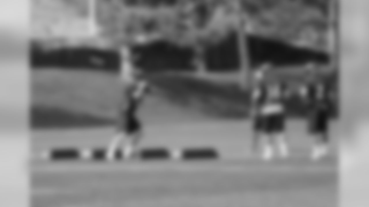 Manning runs through a drill.