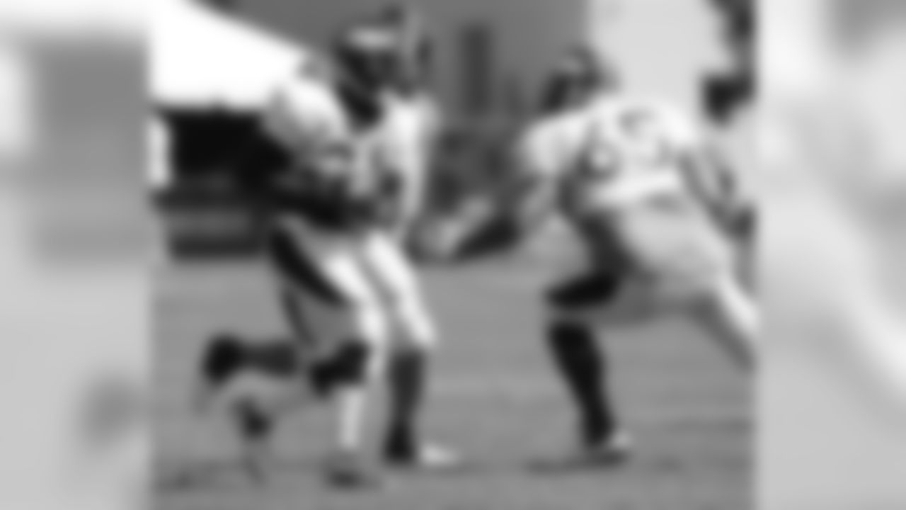 Hillman turns upfield after catching a screen pass.