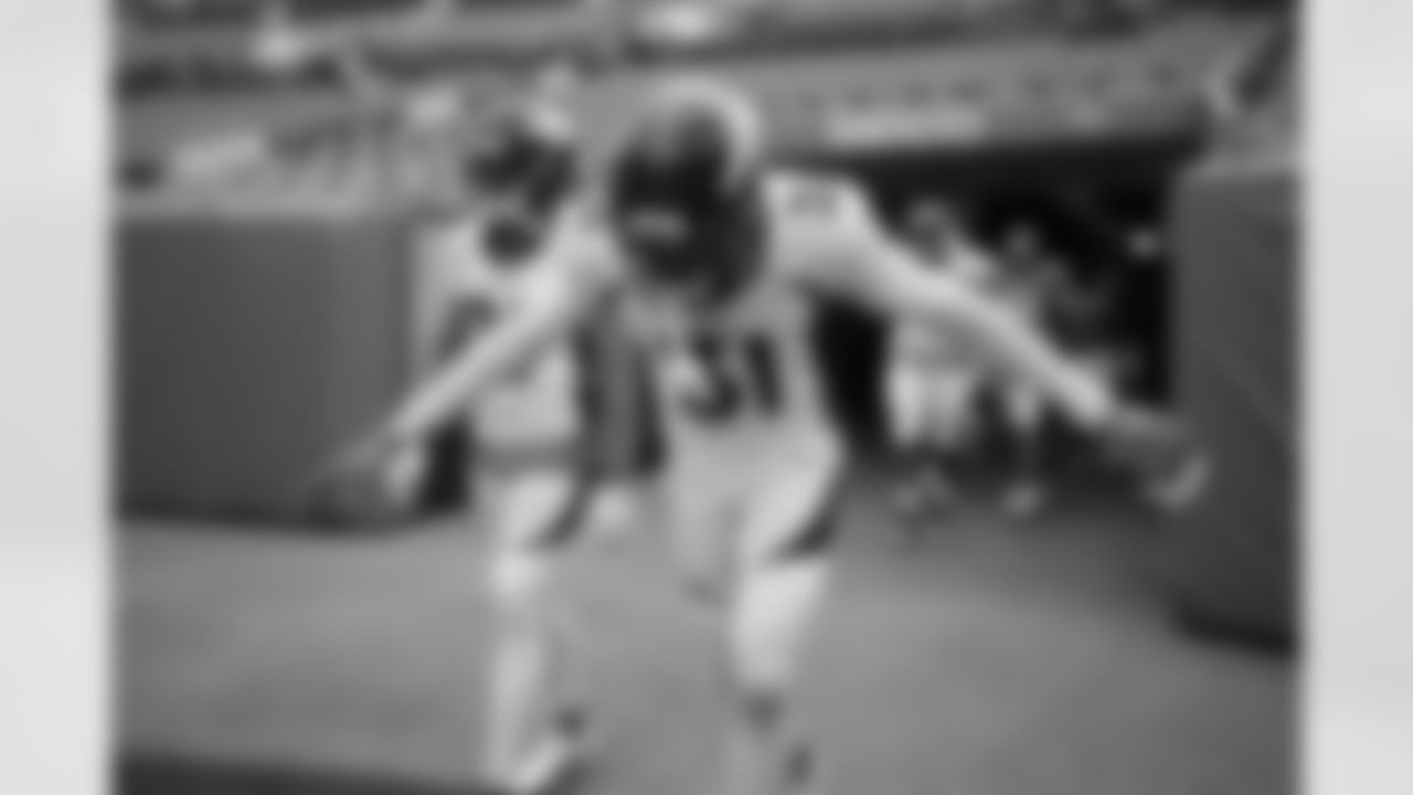 Justin Simmons runs out of the tunnel during practice on Day 12 of training camp at Empower Field at Mile High on August 29, 2020. (Photo by Ben Swanson)