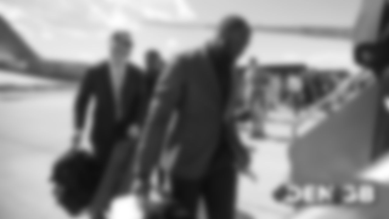 Royce Freeman on the tarmac at Denver International Airport during the team's travel to Wisconsin on September 8, 2019 ahead of their Week 3 game against the Green Bay Packers. (Photo by Ben Swanson)