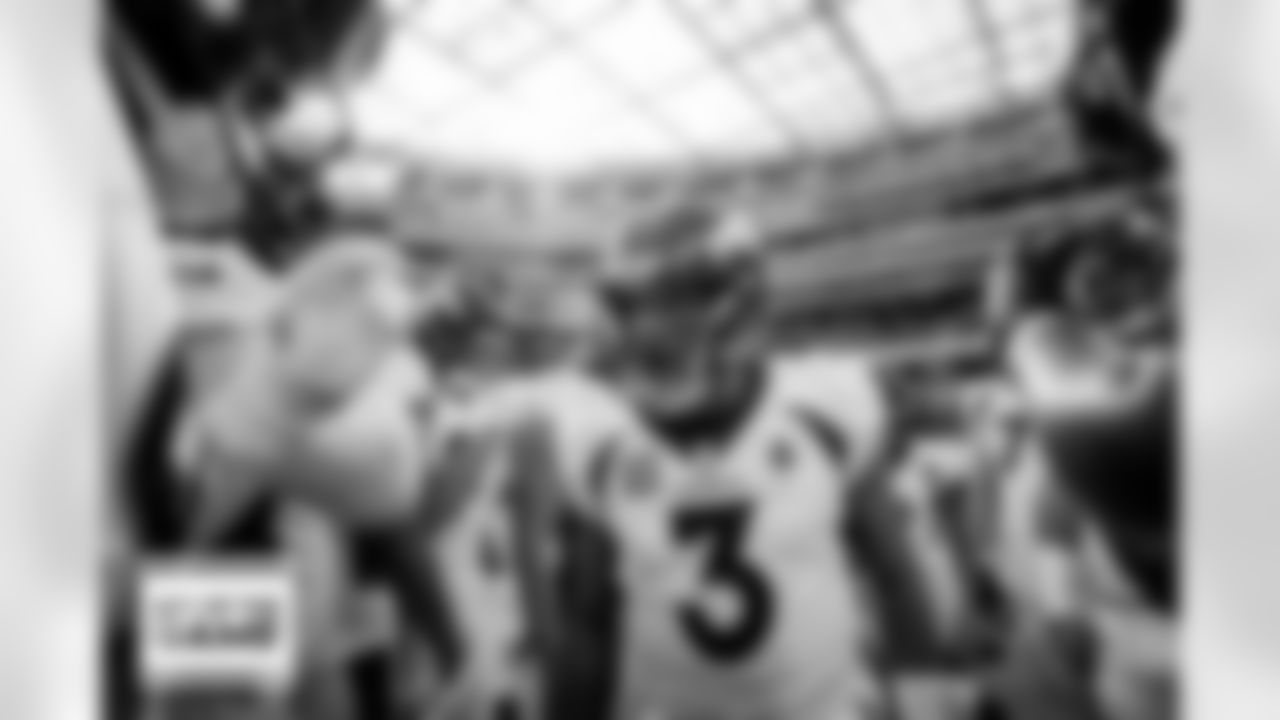 Russell Wilson speaks in the team huddle during pregame warmups before the Broncos' Week 16 game against the Los Angeles Rams at SoFi Stadium in Inglewood, California on December 25, 2022. Photo by Ben Swanson/DenverBroncos.com