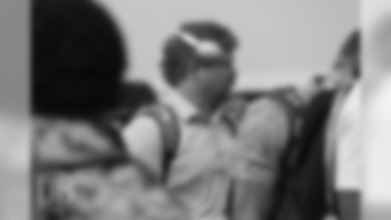 Matt Paradis on the tarmac at Denver International Airport during the team's travel for their preseason game against the Washington Redskins on August 23, 2018.