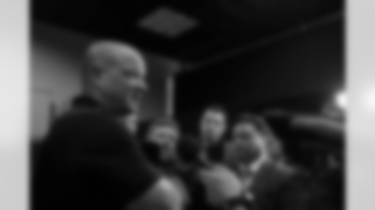 Head Coach Nathaniel Hackett speaks with local media in a scrum after his press conference at the 2022 NFL Scouting Combine in Indianapolis, Indiana on March 1, 2022. (Photo by Ben Swanson)
