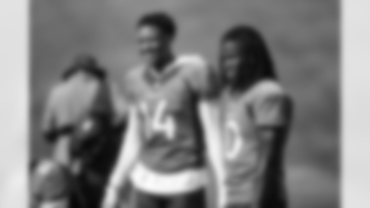 Courtland Sutton smiles as he stands next to Jerry Jeudy during the fifth training camp practice at UCHealth Training Center on August 19, 2020. (Photo by Ben Swanson)