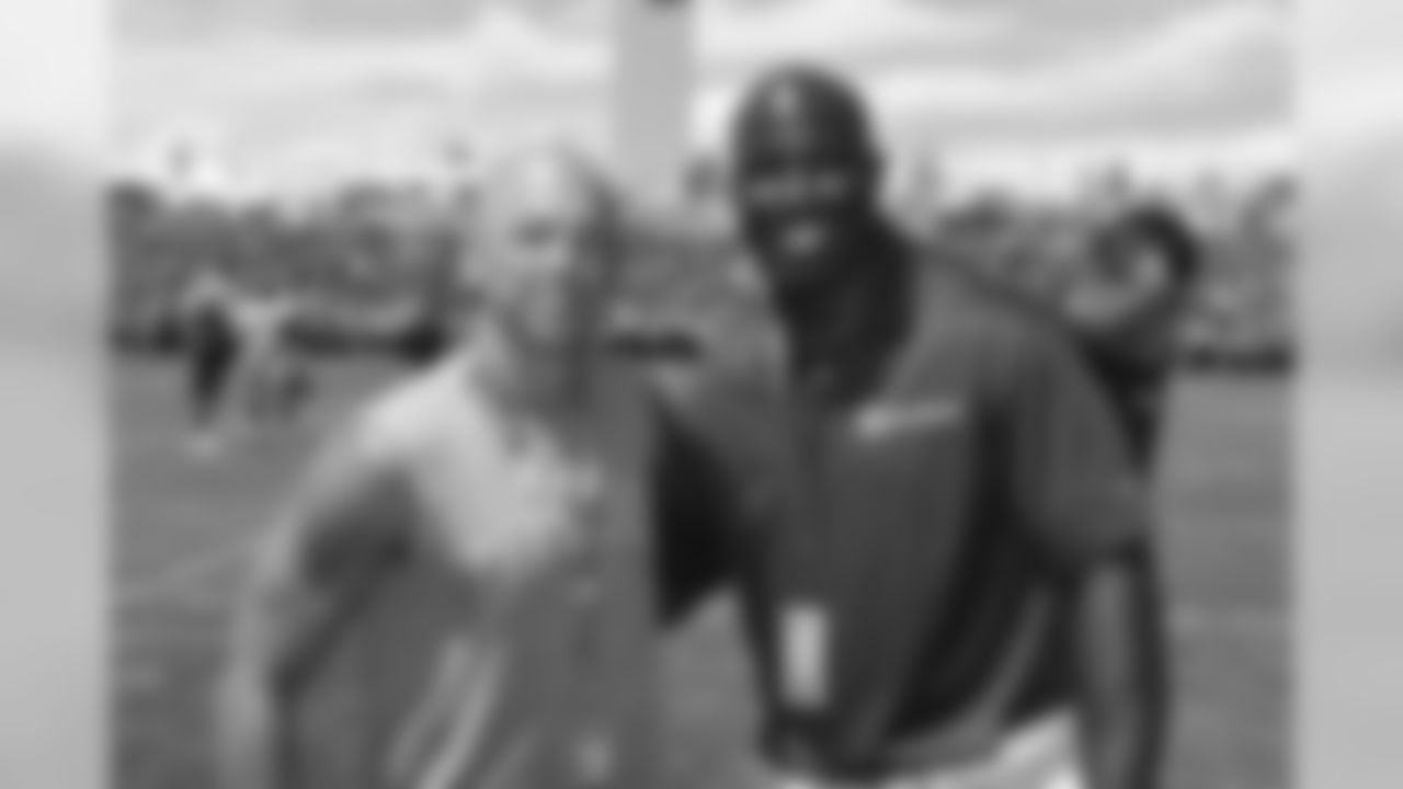Former Denver Bronco Terrell Davis with Kenny Chesney at Denver Broncos training camp August 8, 2015 at the UCHealth Training Center in Englewood,CO.