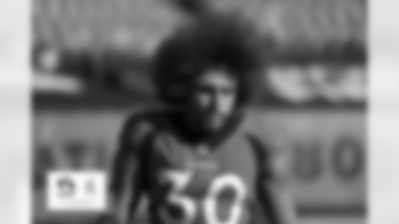 Phillip Lindsay wears a Salute to Service headband during the NFL game against the Miami Dolphins at Empower Field at Mile High in Denver, Colorado, November 22, 2020.
Photo by Gabriel Christus