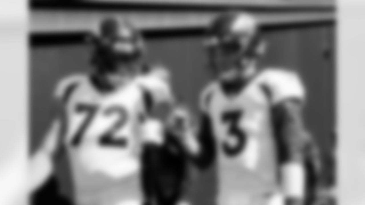 Garett Bolles and Drew Lock during team introductions in the tunnel before the Broncos' Week 6 game against the New England Patriots at Gillette Stadium in Foxborough, Massachusetts, on October 18, 2020. (Photo by Ben Swanson)
