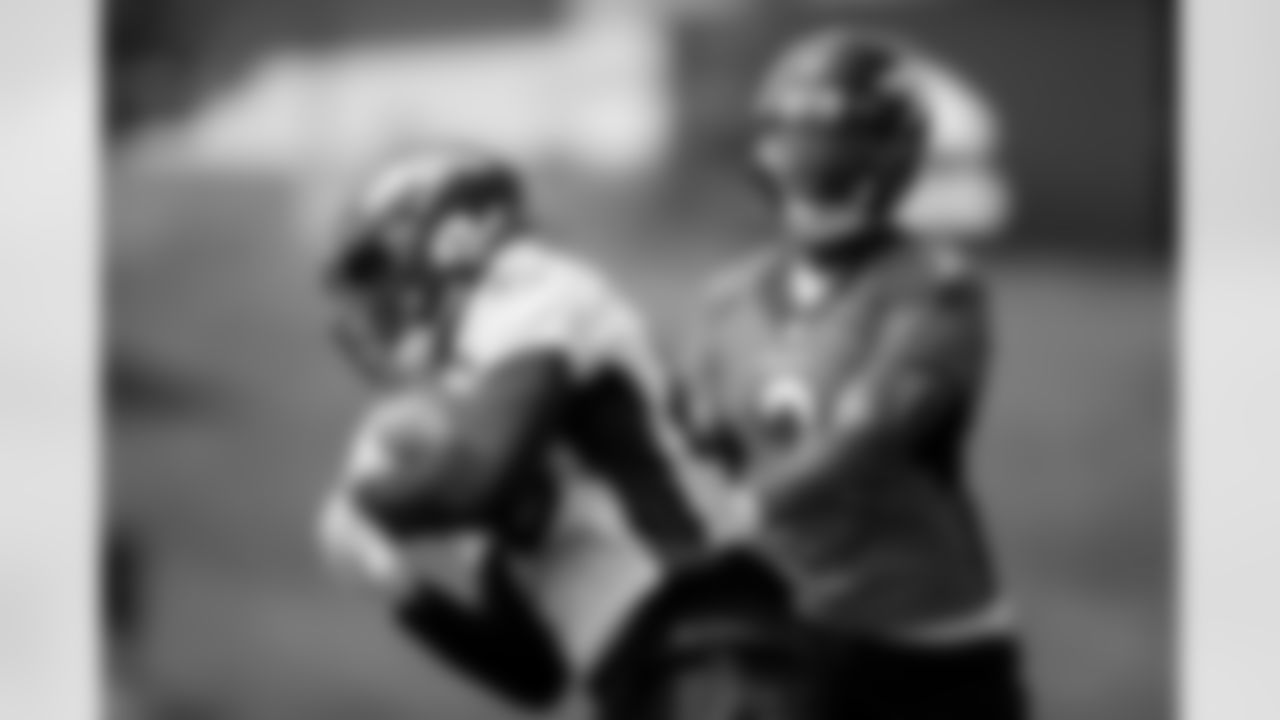 Branden Mack and Pat Surtain II during practice on the 14th day of training camp at UCHealth Training Center on August 16, 2021. (Photo by Ben Swanson)