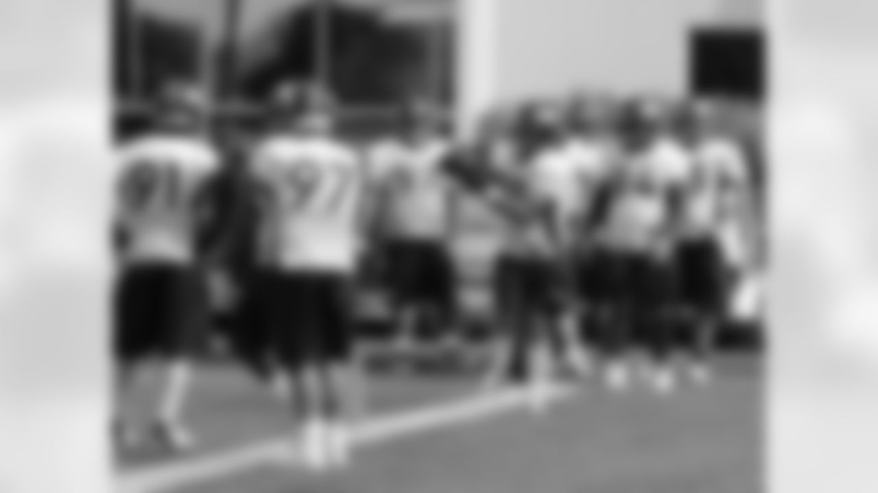 DL Derek Wolfe makes a catch.