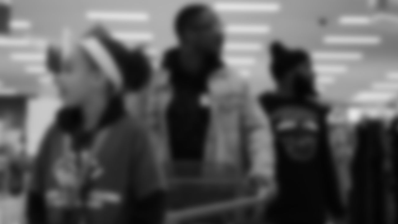 Will Parks and Darian Stewart during Will Parks' shopping spree for the Boys & Girls Club of Metro Denver on Dec. 3, 2018
