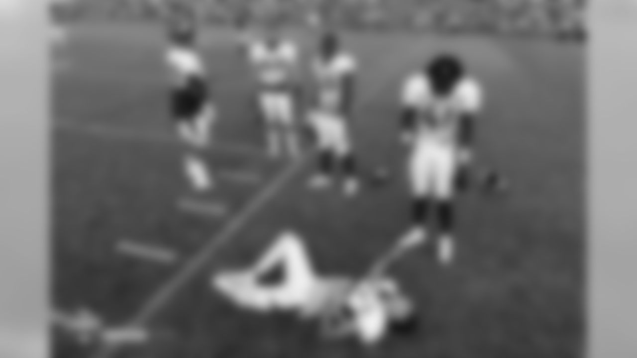 Nose tackle Kyle Peko (90), linebacker Marcus Rush (49), inside linebacker Joseph Jones (43), cornerback Isaac Yiadom (41) and safety Justin Simmons (31) get loose before the eighth day of training camp on August 5, 2018, at UCHealth Training Center.