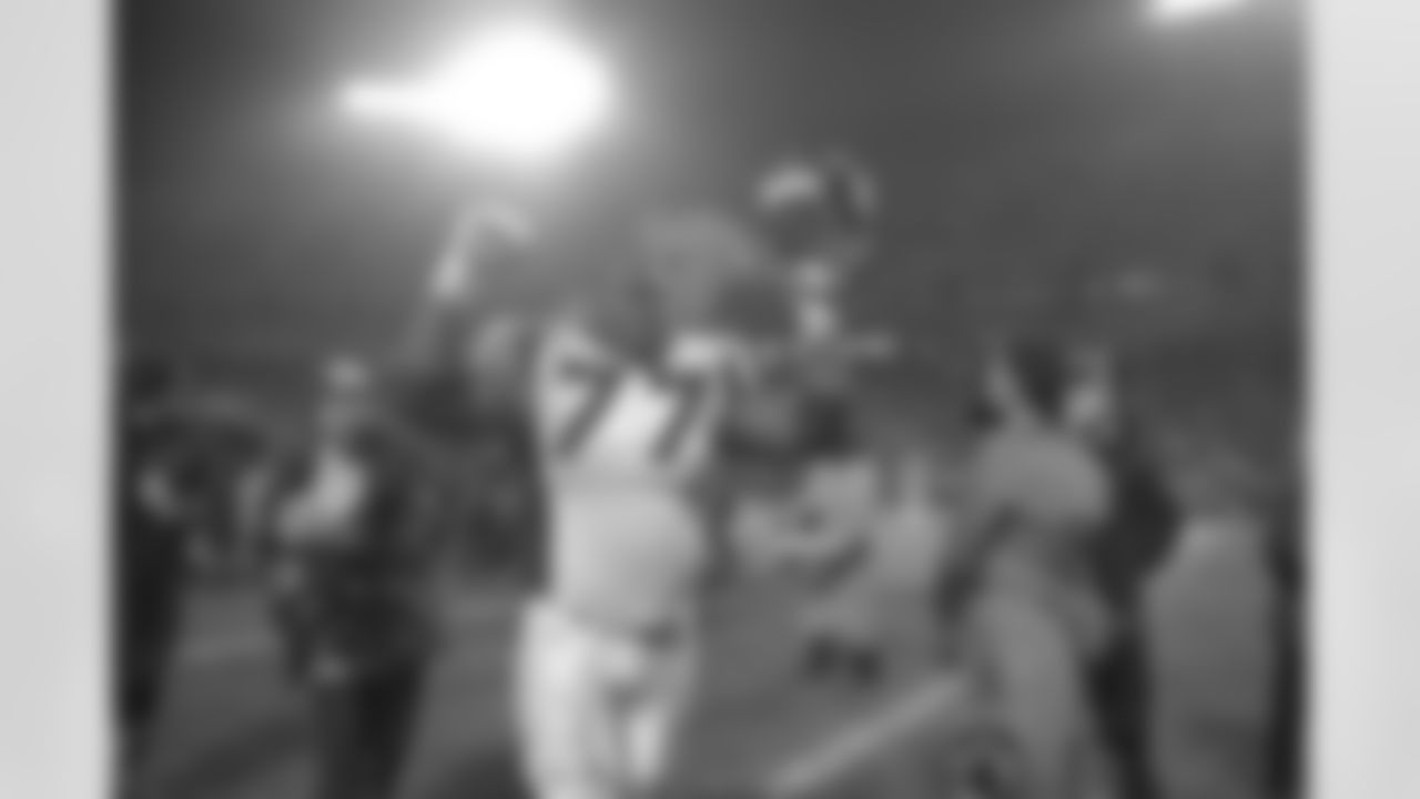 Kansas City: Tony Jones walks triumphantly off the Arrowhead Stadium Field after the Broncos win their second round playoff game against the Kansas City Chiefs at Arrowhead Stadium in Kansas City, MO on January 4, 1998.