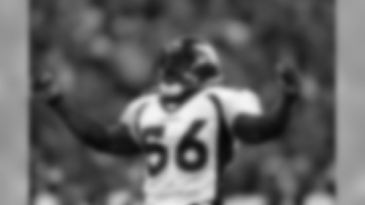 Al Wilson gets the fans pumped up against the San Diego Chargers at Invesco Field at Mile High in Denver, CO on November 16, 2003.