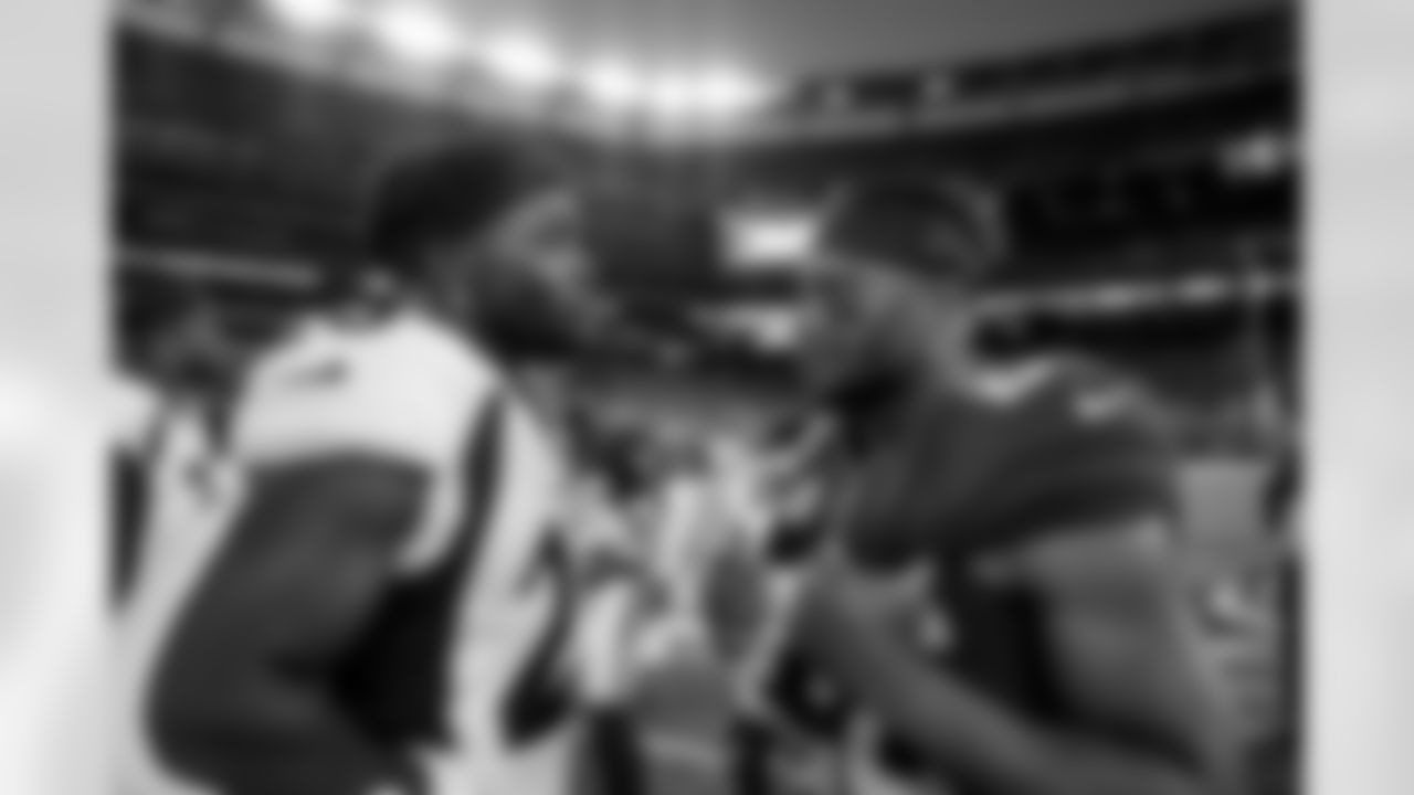 Melvin Gordon III and New York Giants running back Saquon Barkley (26) during the Broncos' Week 1 game against the New York Giants at MetLife Stadium in East Rutherford, New Jersey, on September 12, 2021. (Photo by Gabriel Christus)