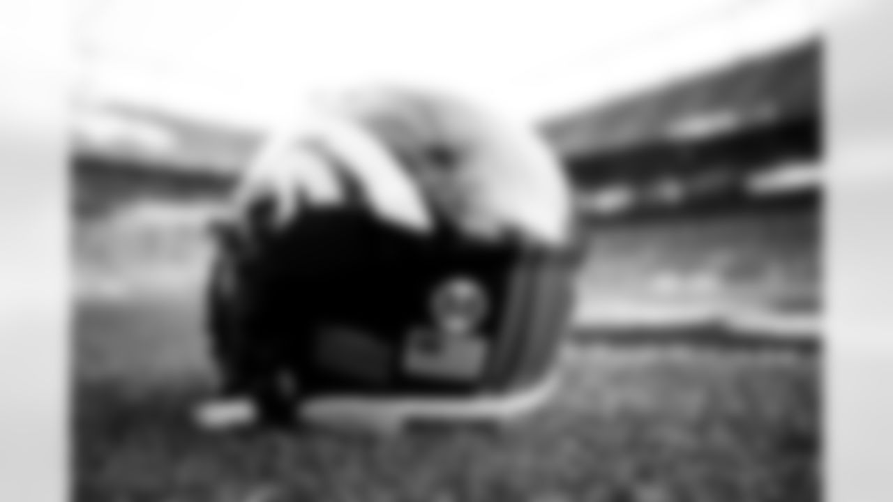 A helmet with a decal honoring Demaryius Thomas before the Broncos' Week 14 game against the Detroit Lions at Empower Field at Mile High in Denver, Colorado on December 12, 2021. (Photo by Ben Swanson)