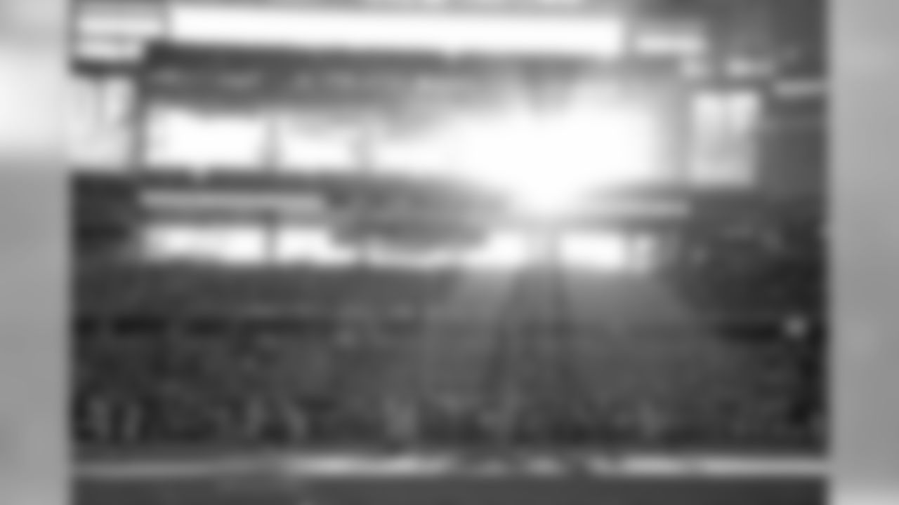 Sunlight streams in the open end zone doors of AT&T Stadium during an NFL football game between the Dallas Cowboys against the Denver Broncos on Sunday, October 6, 2013, at AT&T Stadium in Arlington, Texas. The Broncos defeated the Cowboys, 51-48. (AP Photo/James D. Smith)