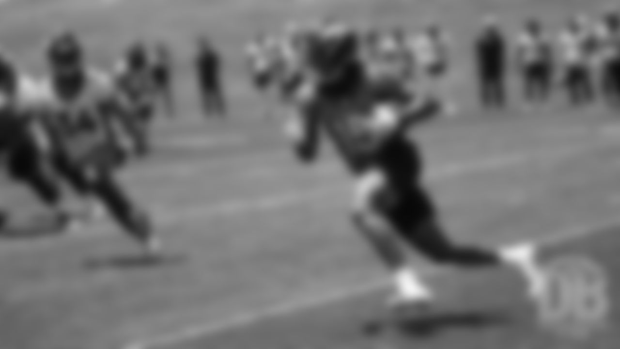 Juwann Winfree turns upfield during the Broncos' practice on the ninth day of their OTAs on May 31, 2019.