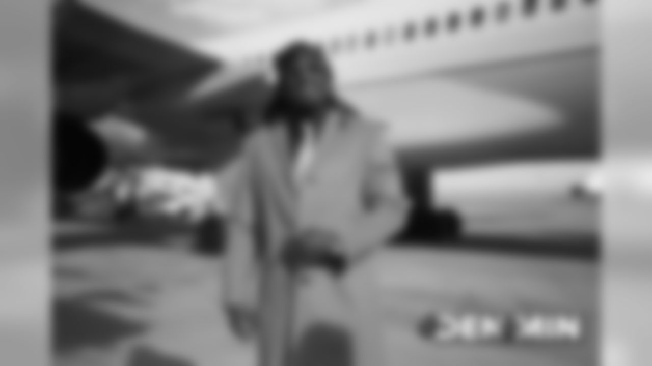 Alexander Johnson on the tarmac at Denver International Airport during the team's travel to Minnesota on November 16, 2019 to face the Vikings.. (Photo by Gabriel Christus)