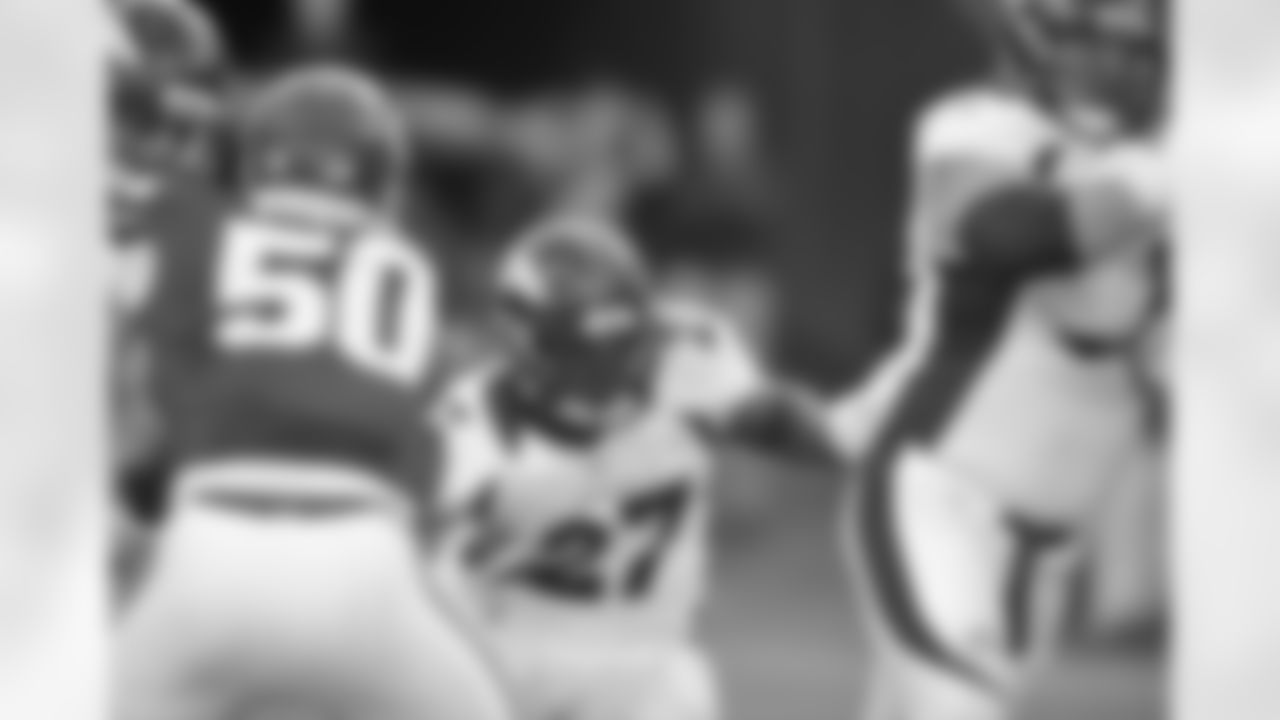 Moreno looks for a hole in the Kansas City defense.