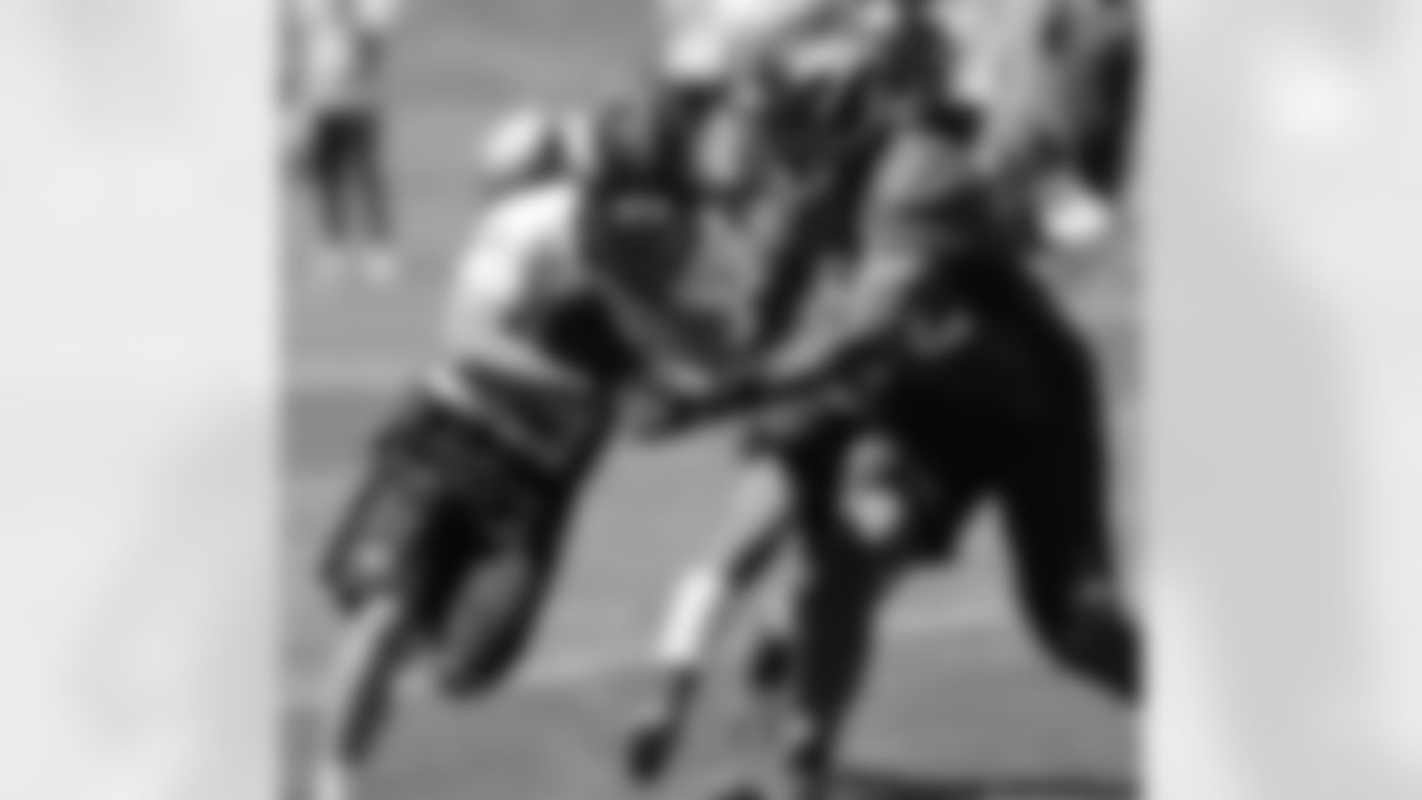 Welker protects the ball.