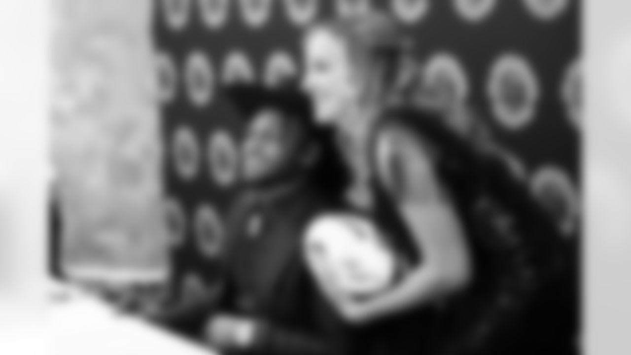 Javonte Williams signs autographs and poses for photos with fans during the Javonte Williams Foundation's Mile High Celebrity Round-Up event at The Ritz-Carlton in Denver, Colorado on December 5, 2022. (Photo by Ellie Kinney)