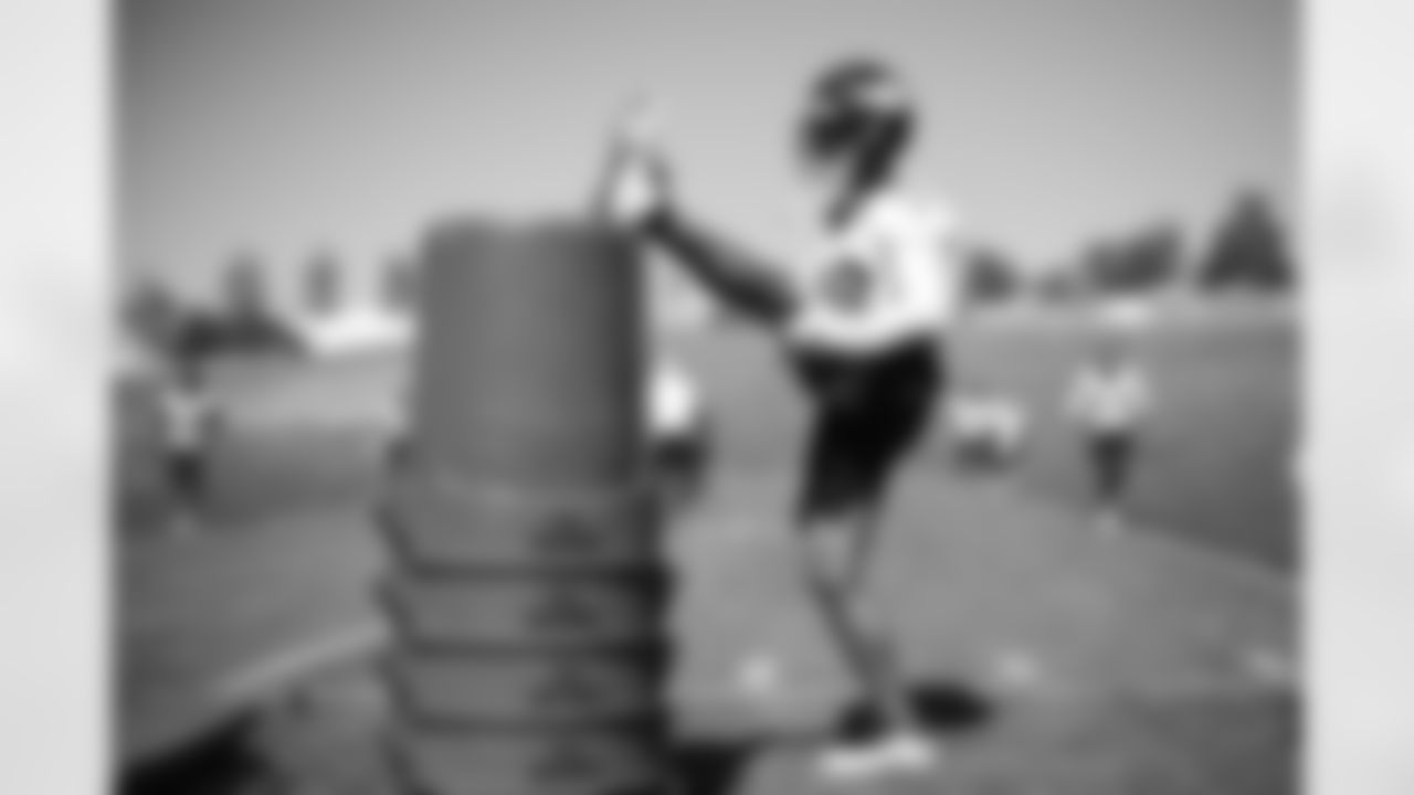 Bryce Callahan stretches during the ninth day of OTA practices at UCHealth Training Center on June 9, 2021. (Photo by Ben Swanson)