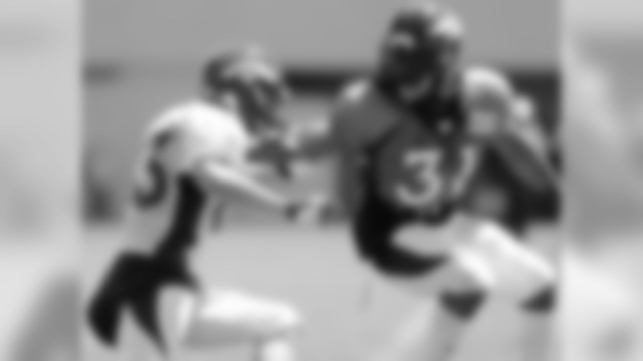 Welker tries to get open against Omar Bolden.