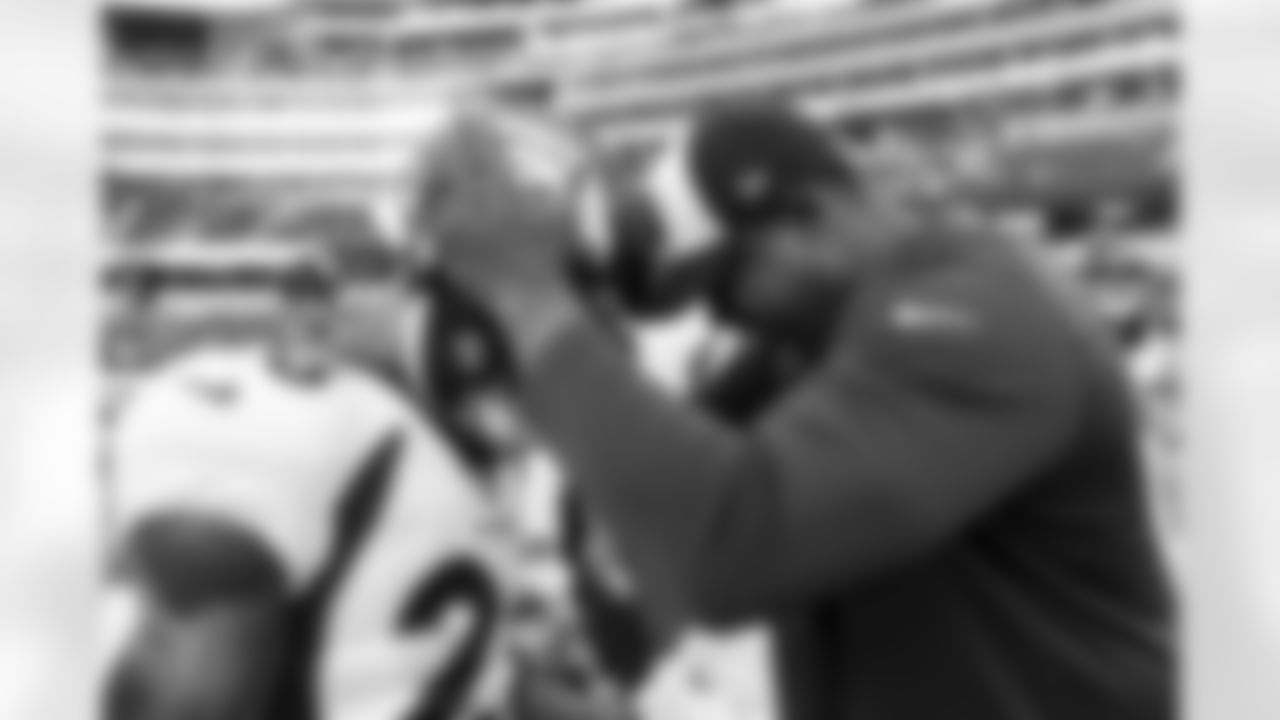 Running Backs Coach Tyrone Wheatley and Mike Boone during pregame warmups before the Denver Broncos' Week 6 game against the Los Angeles Chargers at SoFi Stadium in Inglewood, California on October 17, 2022. (Photo by Ben Swanson)