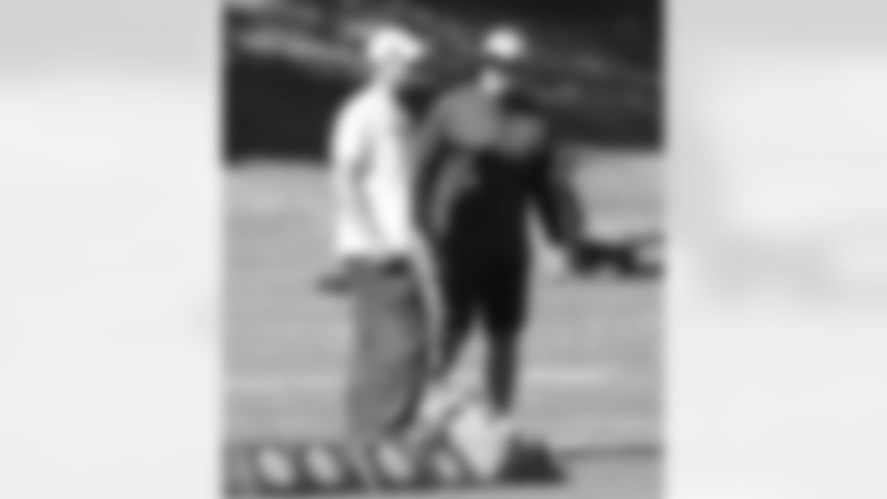 Adam Gase and Jack Del Rio