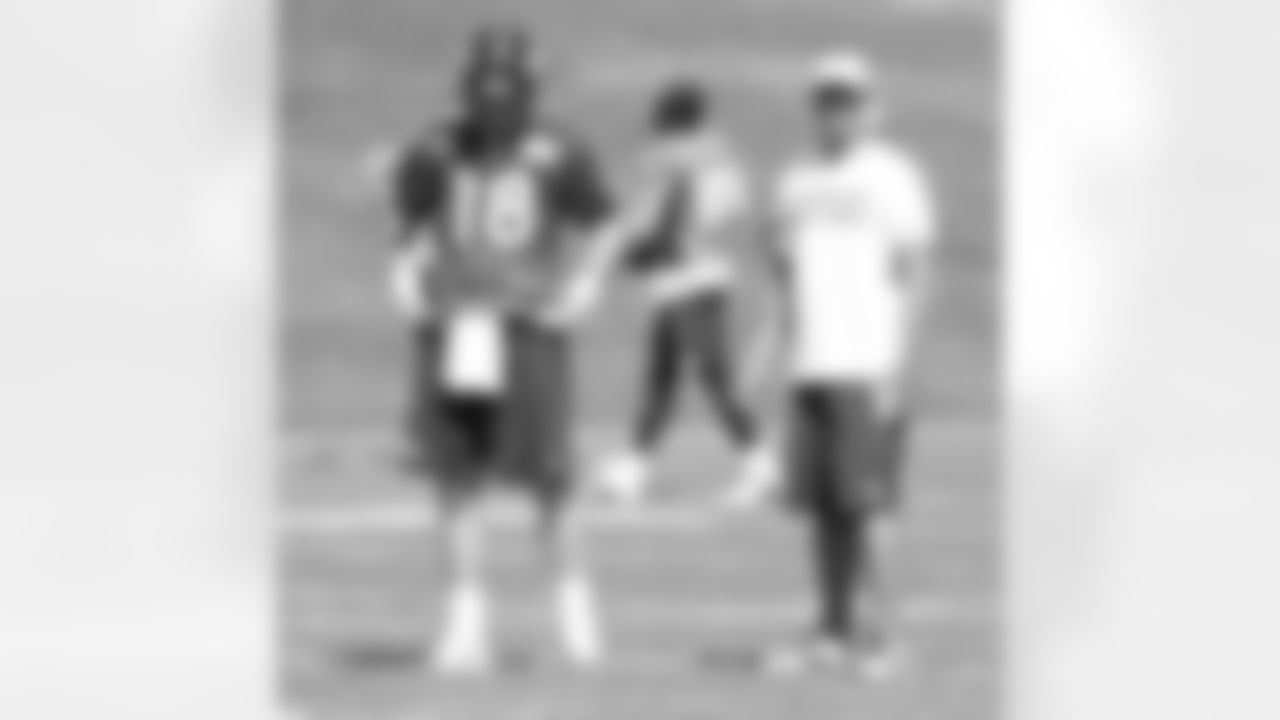 Peyton Manning and Adam Gase