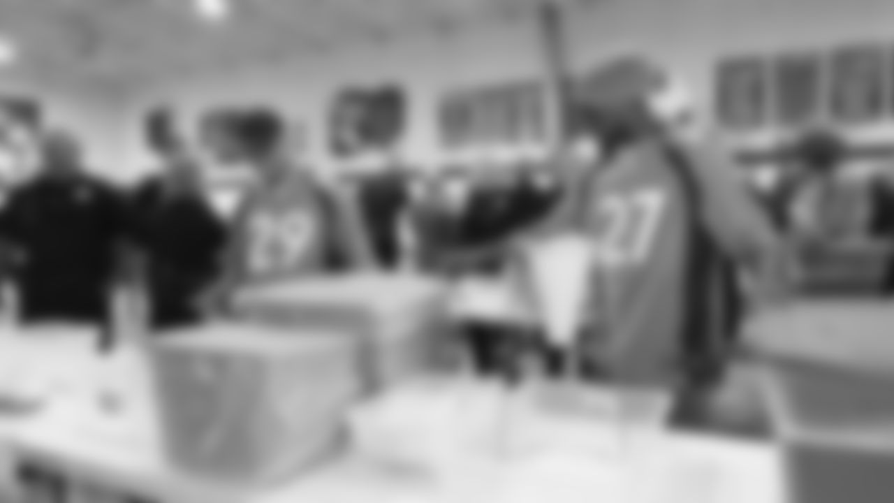 Bryce Callahan and Horace Richardson during a meal-packaging event with Feeding Children Everywhere at the Denver Broncos Boys & Girls Club on May 14, 2019, with volunteers from the Broncos, the Denver Police Department and the club.